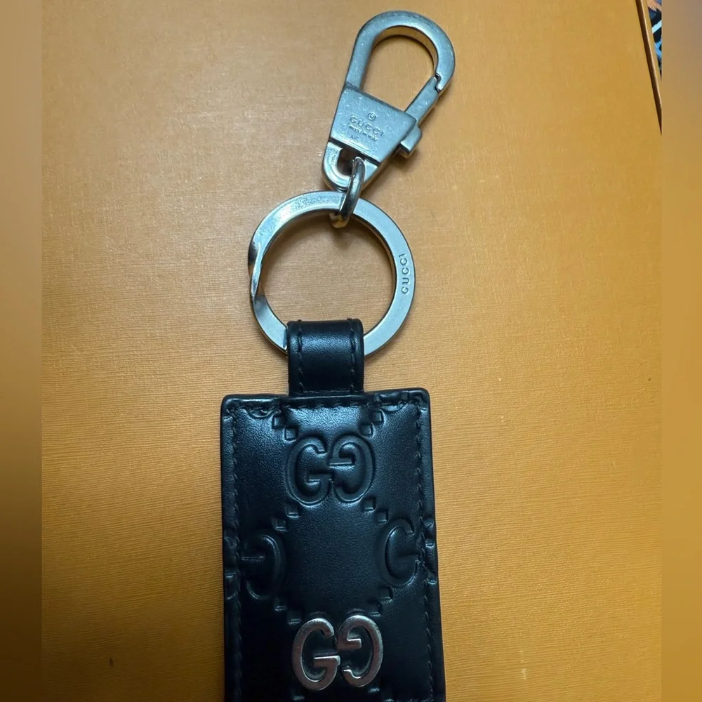 Brand new with box and dustbag Gucci Black Embossed Leather Key Holder keychain